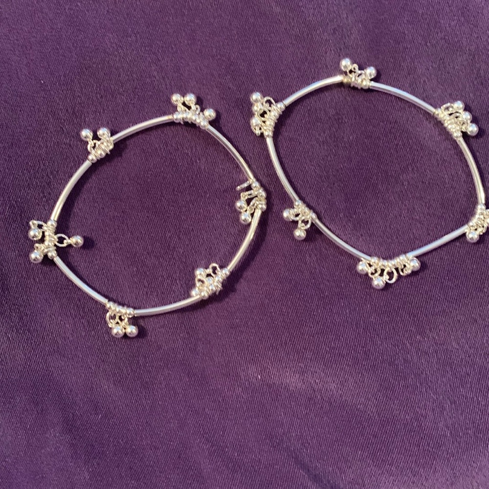 2 Silver tone stretch bracelet with ball charms.  Avon.